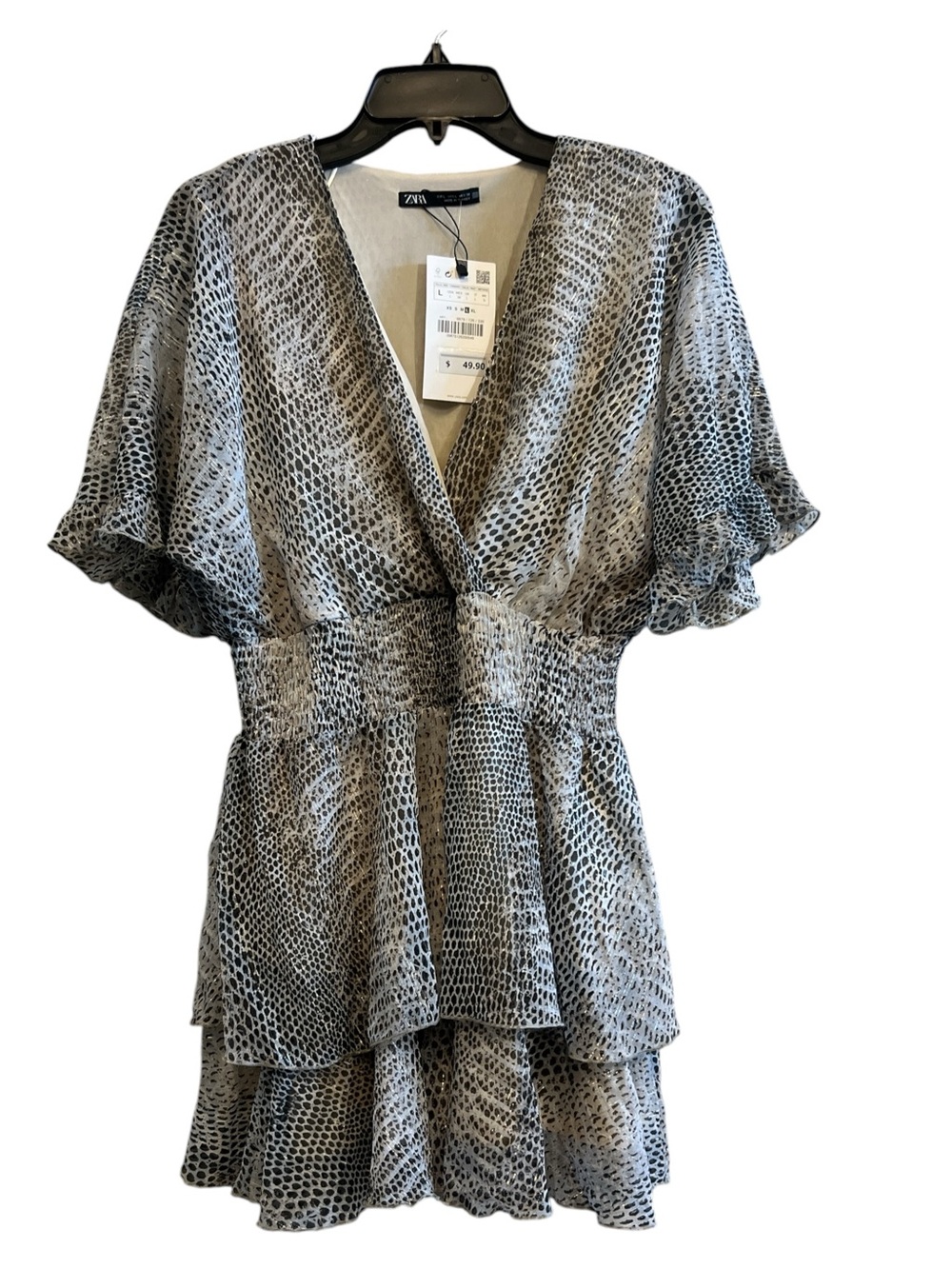 ZARA Animal Print flowy Smocked Ruffle Mini Dress
With Short Flutter Sleeves